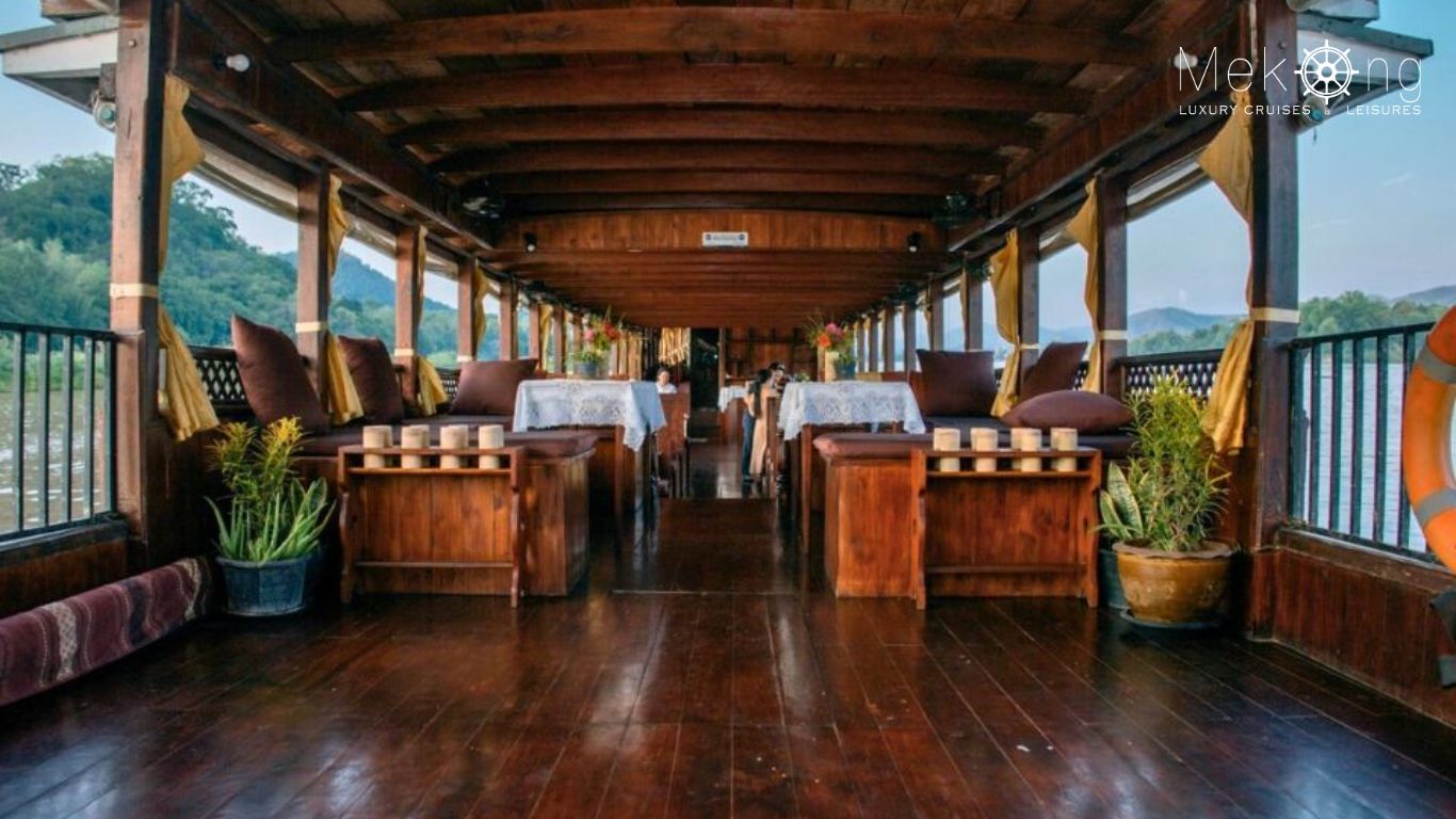 Open-air lounge deck aboard a Mekong River Cruise Laos boat