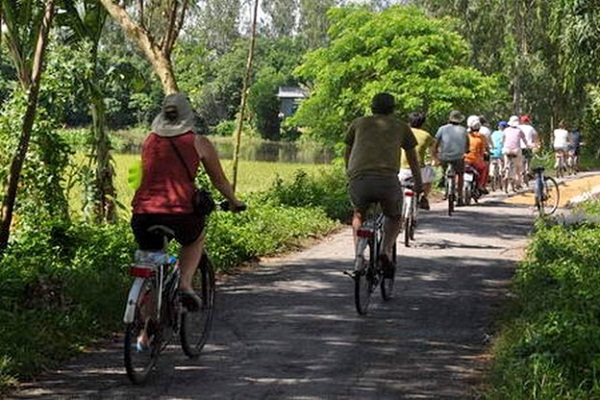 Exploring Mekong Delta with Mekong Delta Cycling and River Cruise