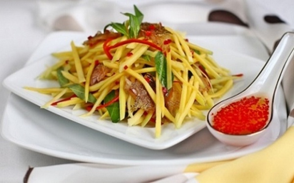 Do not forget to enjoy the special dried mango salad with colorful fish in Can Tho