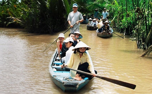 You can travel on the boat ride into the narrow shady waterways to see some more of the real life of the Mekong people