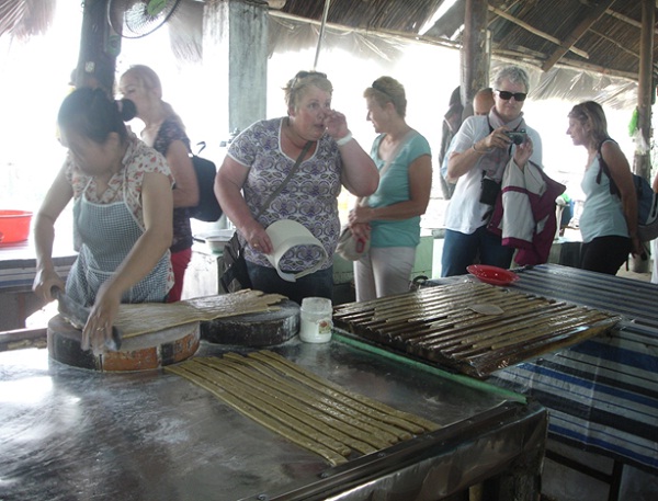 You will witness local families making coconut candies in Ben Tre