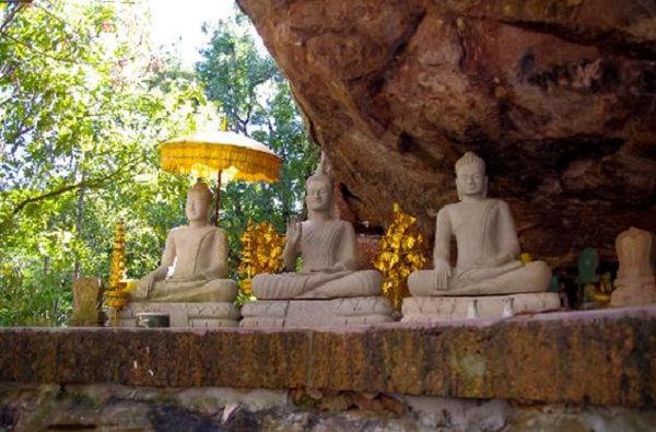 Buddha statues carved into sandstone