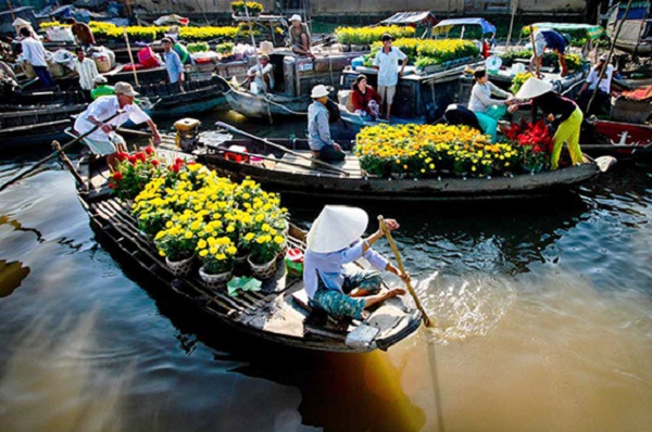 The colorful floating market in Tet holiday