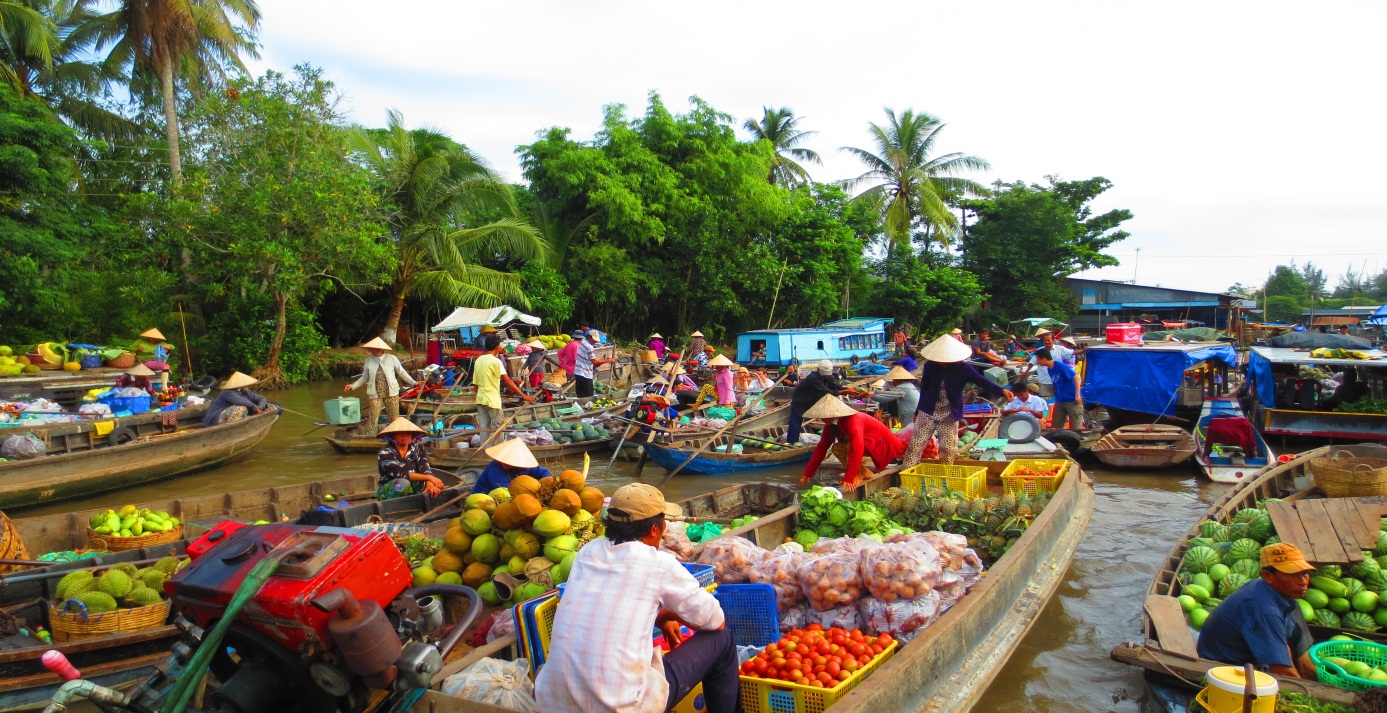 Boats packed with different fruits