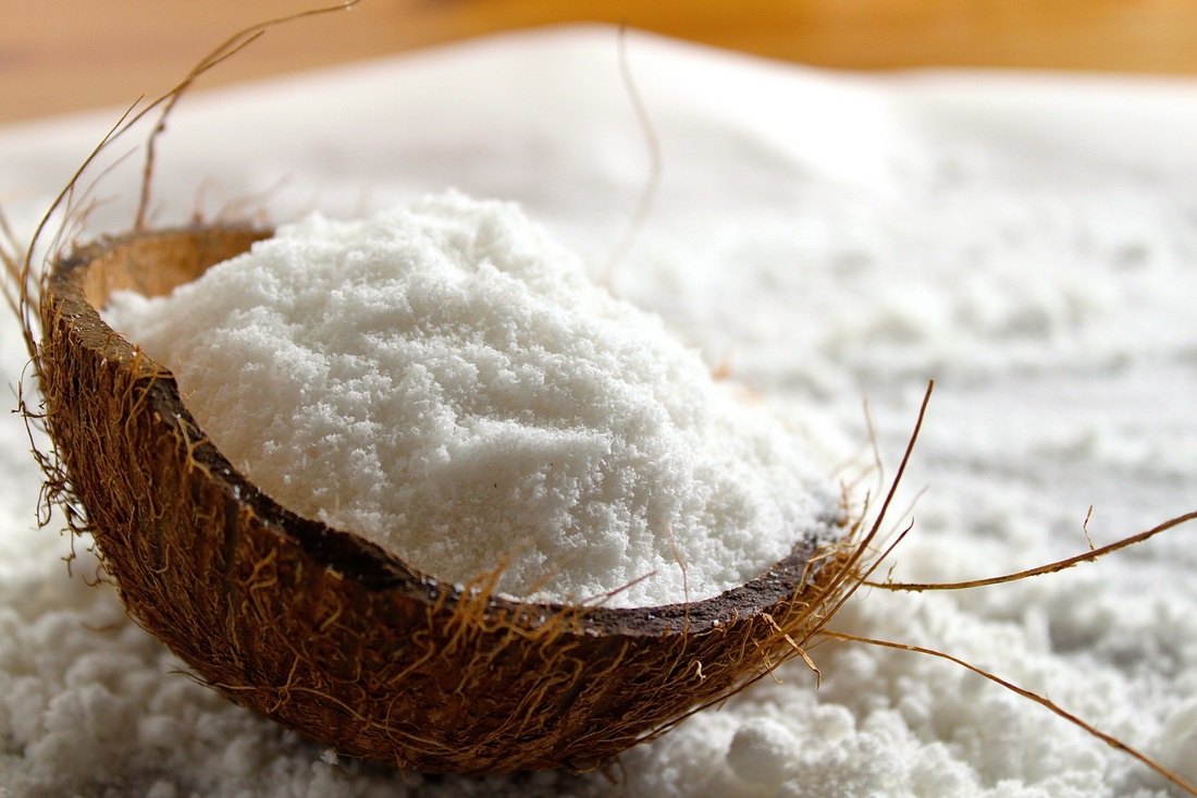 Coconut flesh is grinded to extract milk