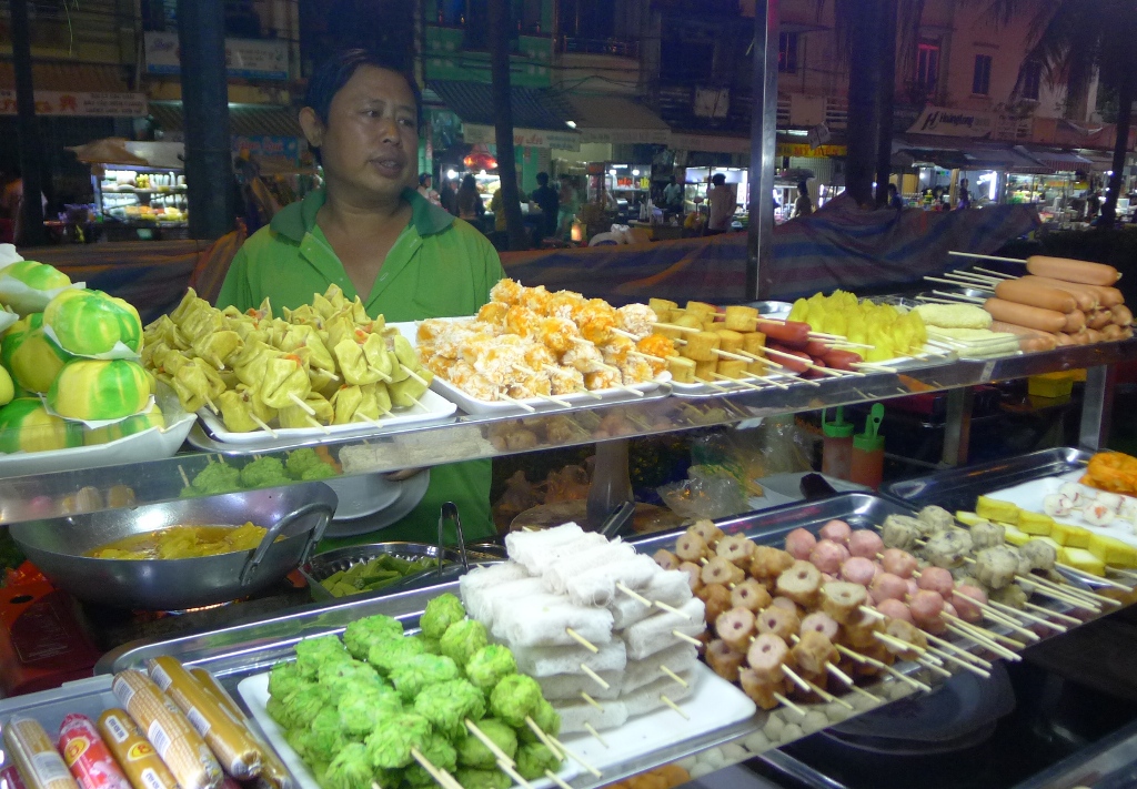A food stall with various dishes 