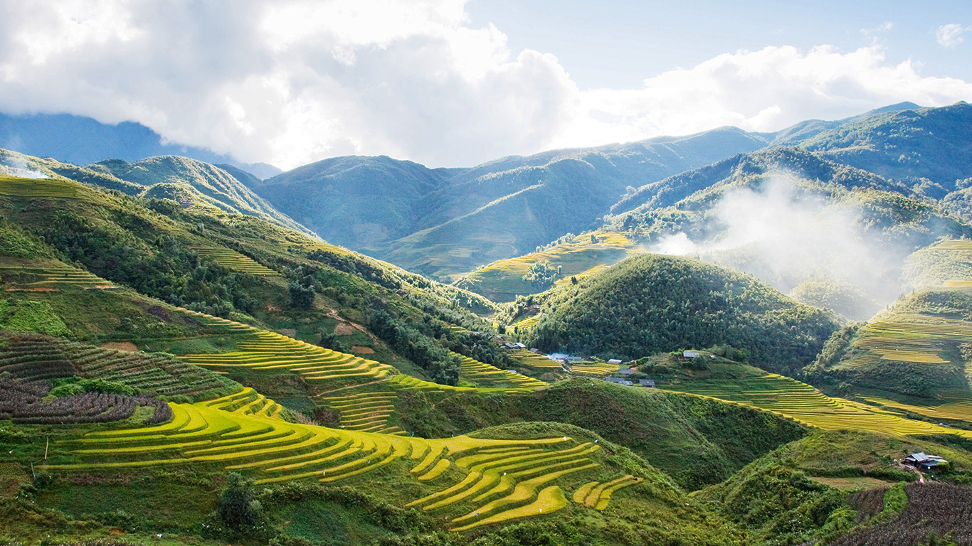 A majestic sight of Sapa in summer with massive mountains