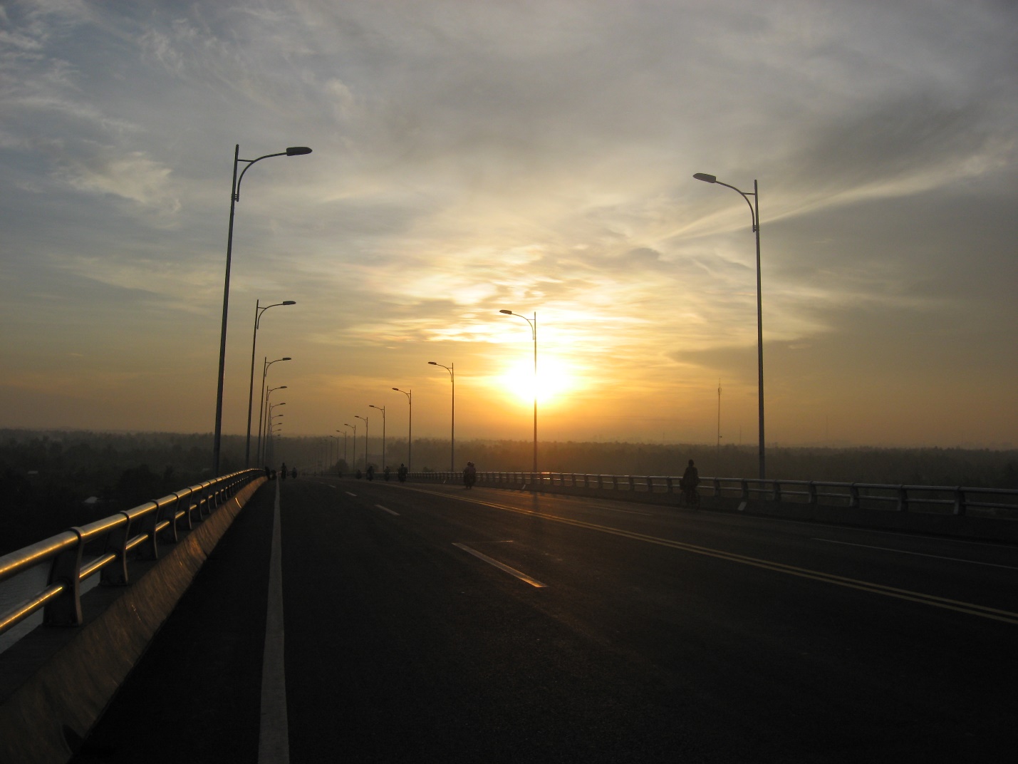 Ham Luong Bridge looks dim in early morning