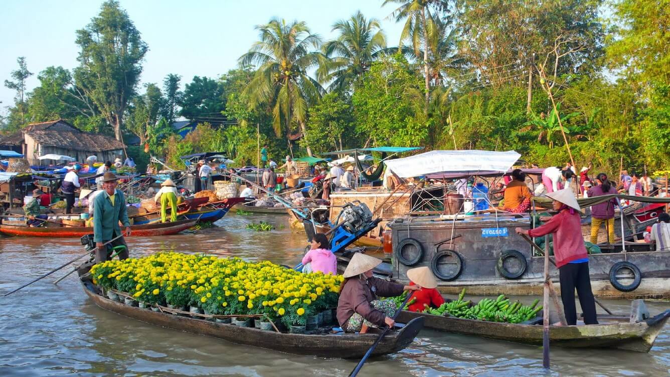 Passing buy floating market and buy some products from the local people