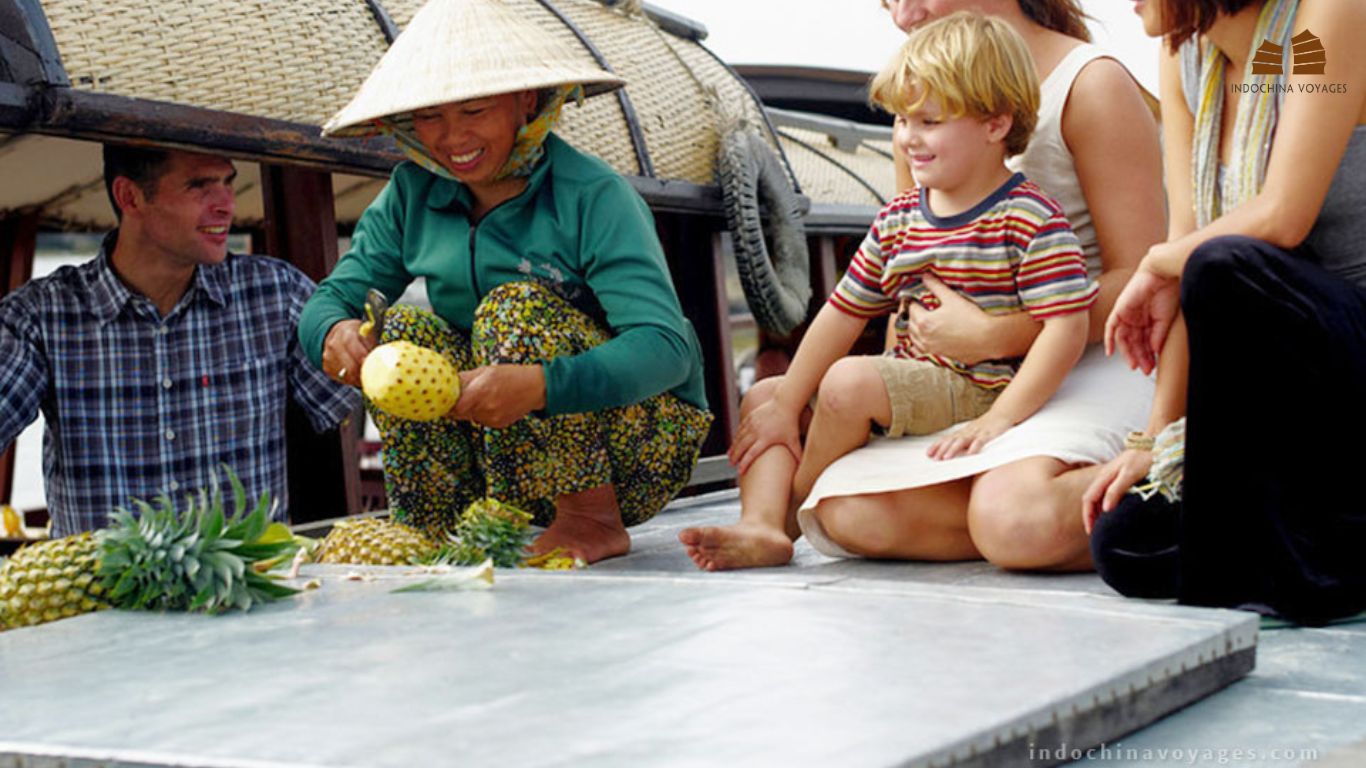 travelers in Mekong river floating market