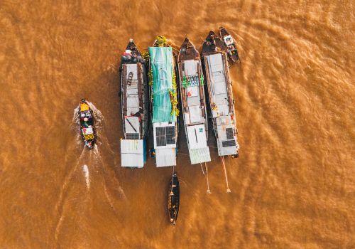 Aerial shot of boats at Cái Răng Floating Market in Cần Thơ, Vietnam